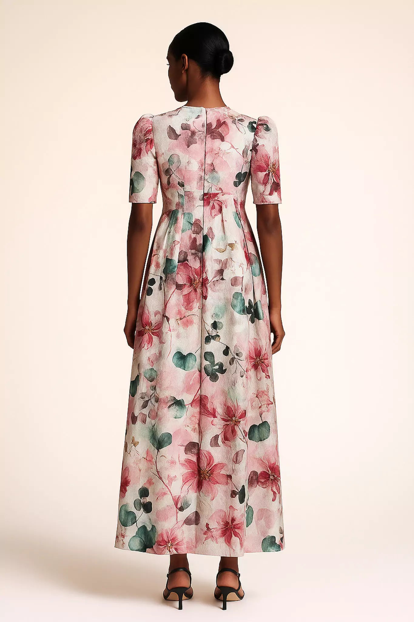 Back view of floral jacquard dress by FRAQAIR, elegant silhouette in motion