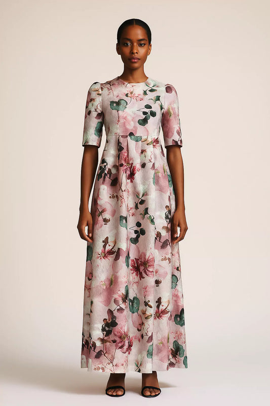 Model wearing floral jacquard dress front view, tailored in Italy by FRAQAIR
